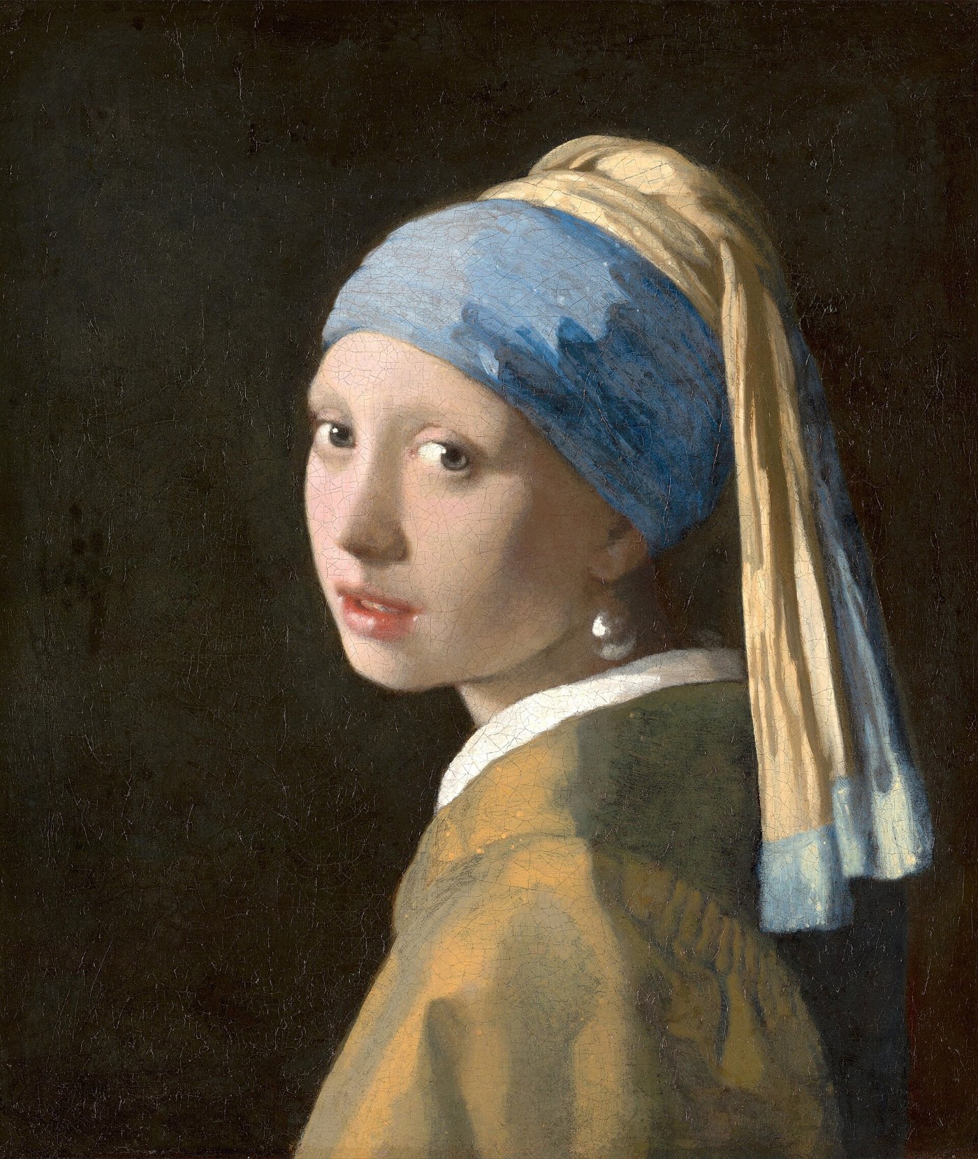 Vermeer's painting of a girl looking over her shoulder, in a blue and yellow turban, with a large pearl at her ear, against a dark background.